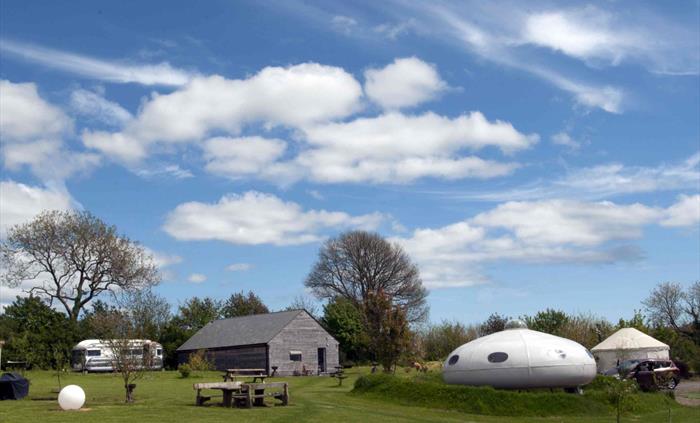 Showmans caravan, shower block, UFO and Yurt